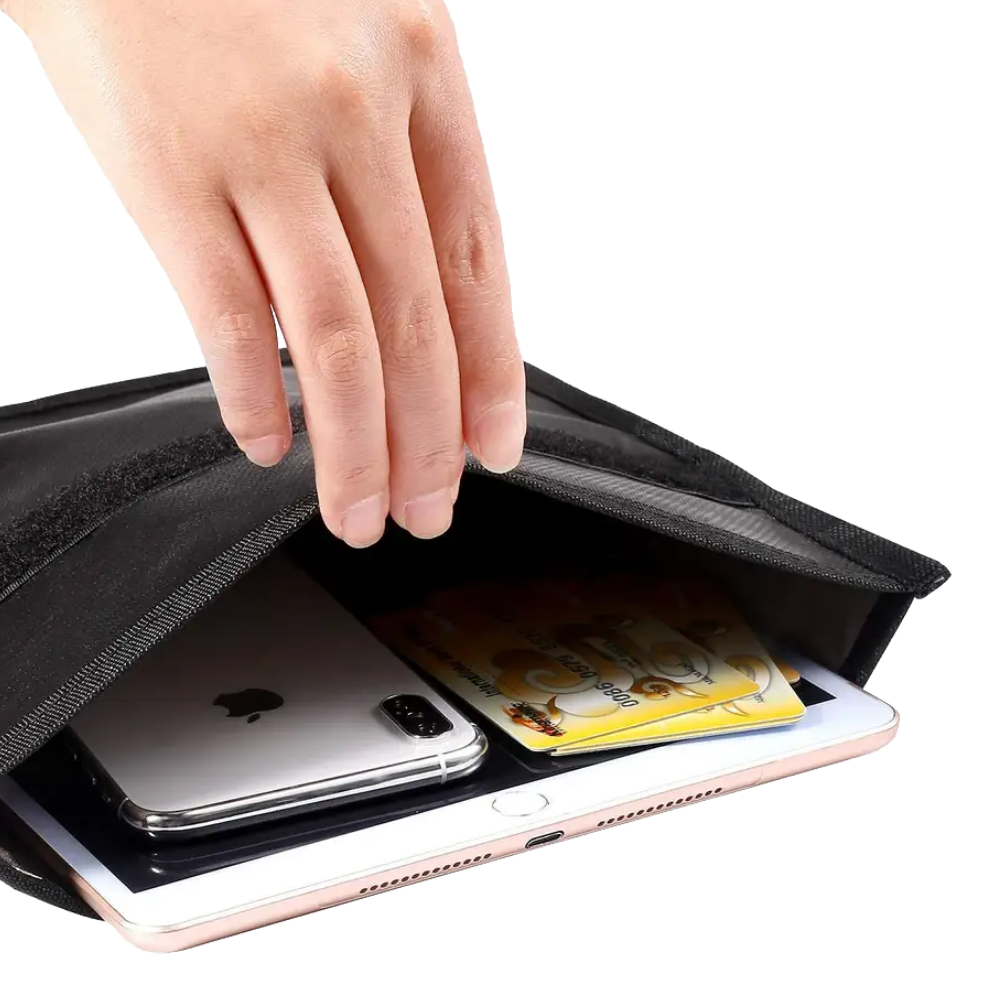 Black phone case with a phone and cards inside, held by a hand.