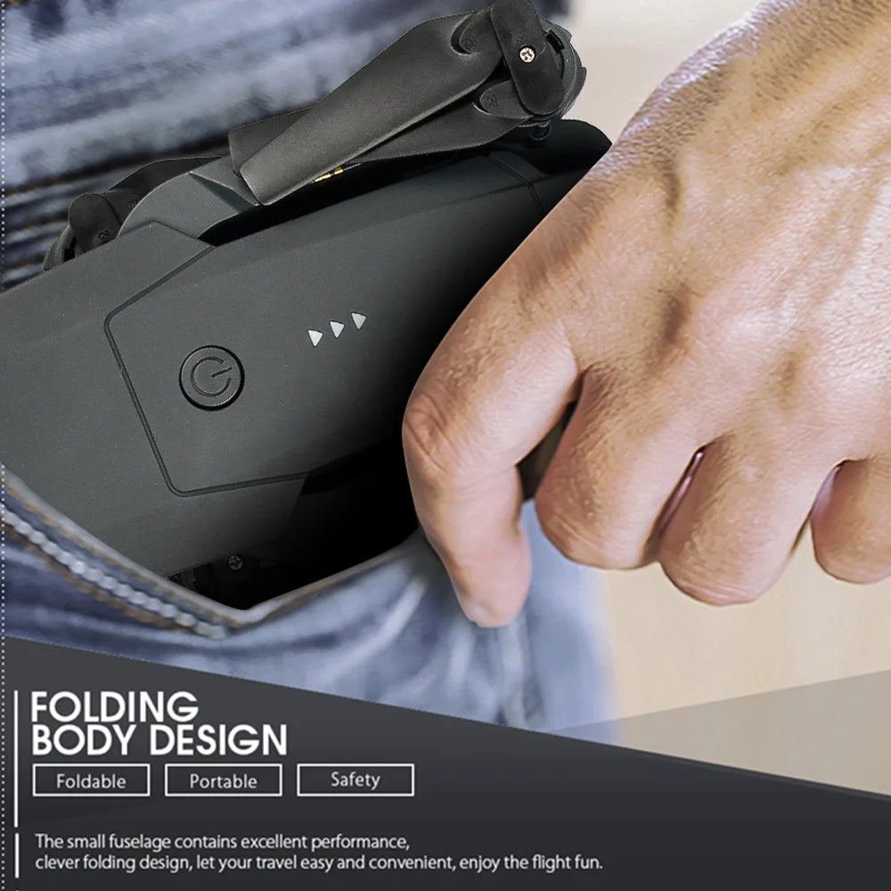 Hand holding a folding drone with text highlighting features like foldable, portable, and safety.