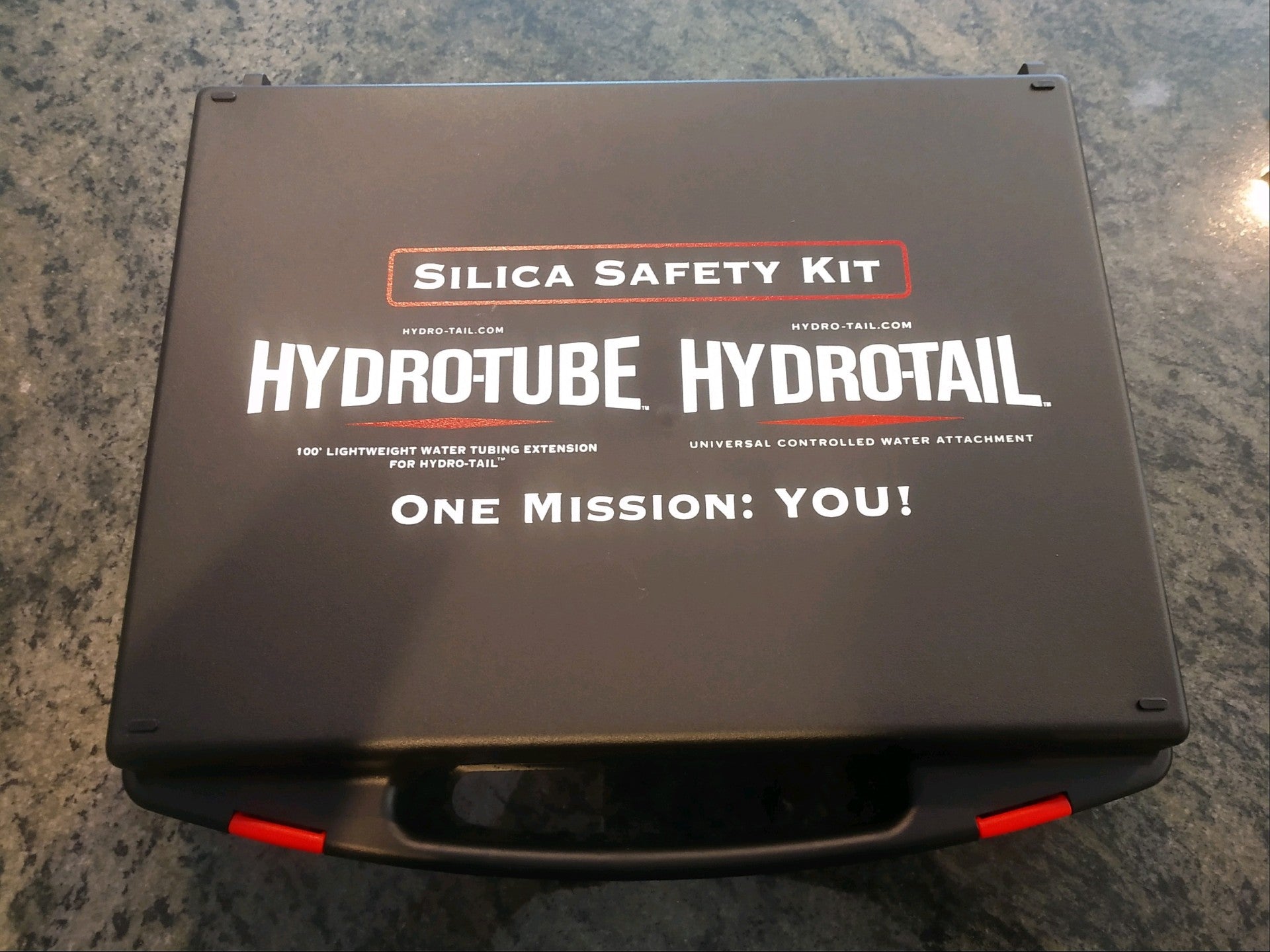 Silica safety kit box with 'HydroTube' and 'HydroTail' branding on a gray surface.
